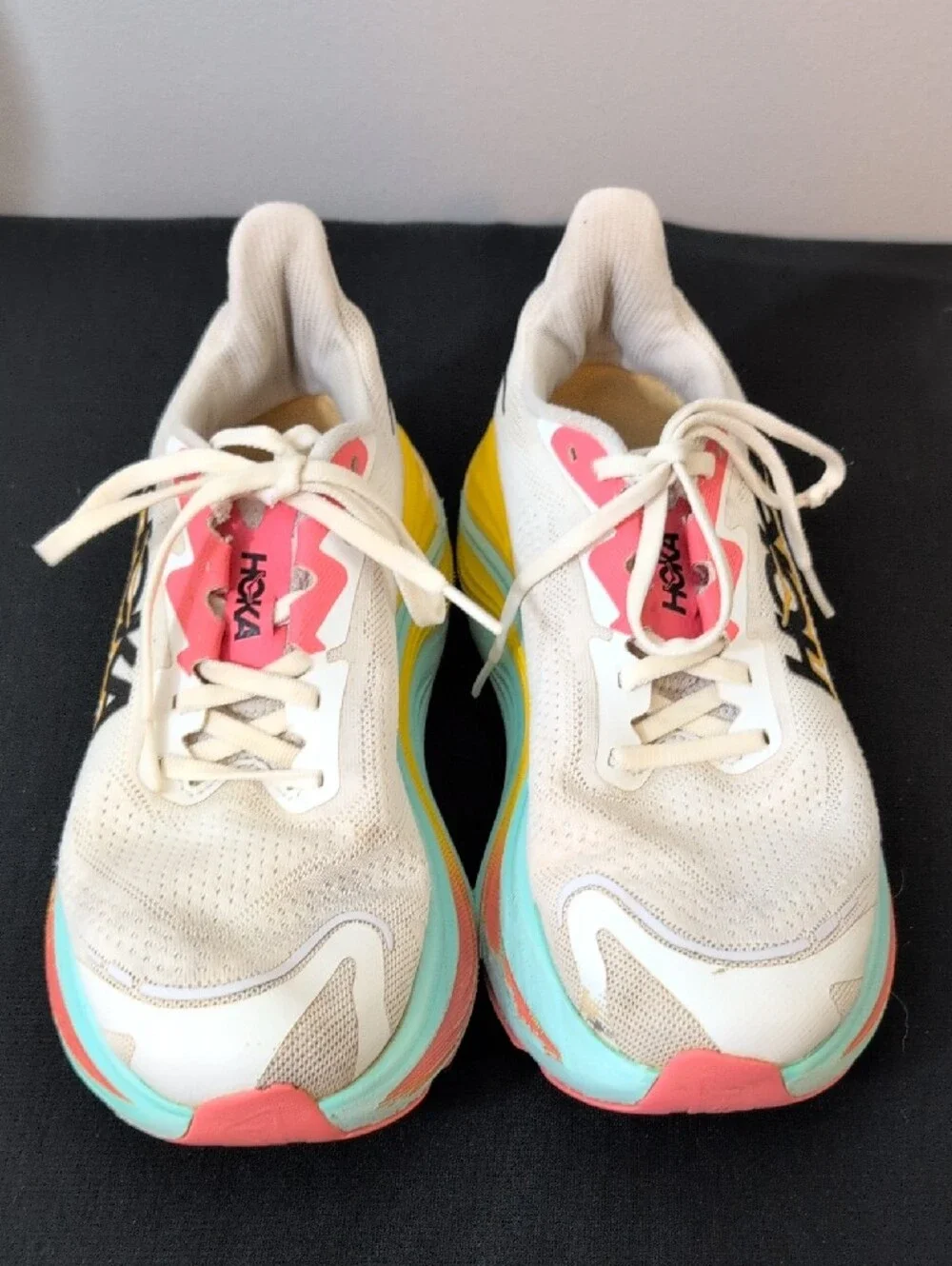 Hoka white blue shoe interior label